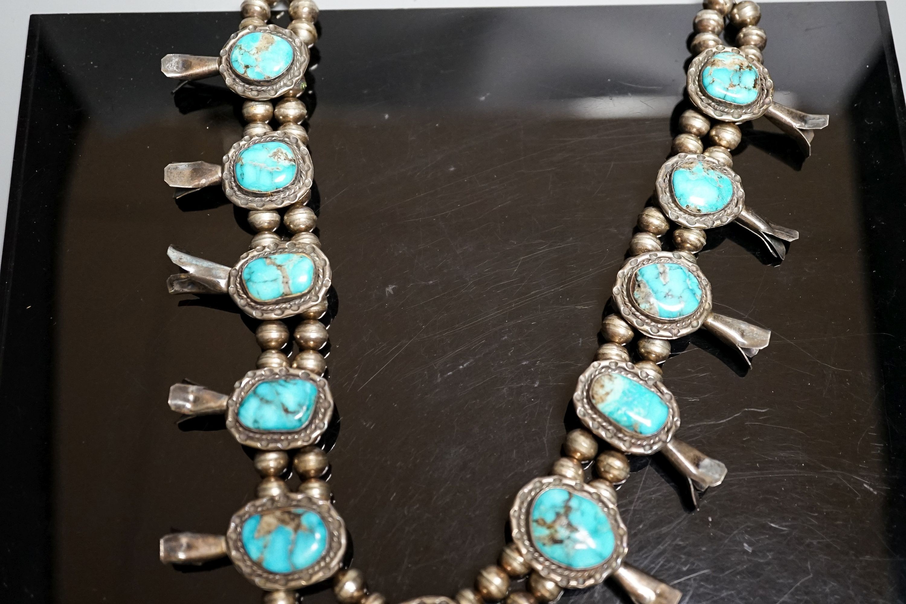 A South American? white metal and turquoise set necklace, 72cm.